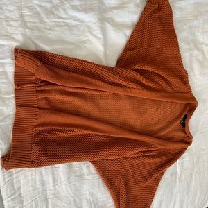 Orange knitted cardigan